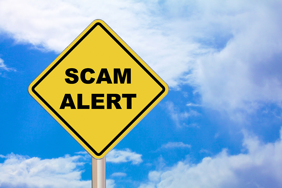 Image of a scam alert sign